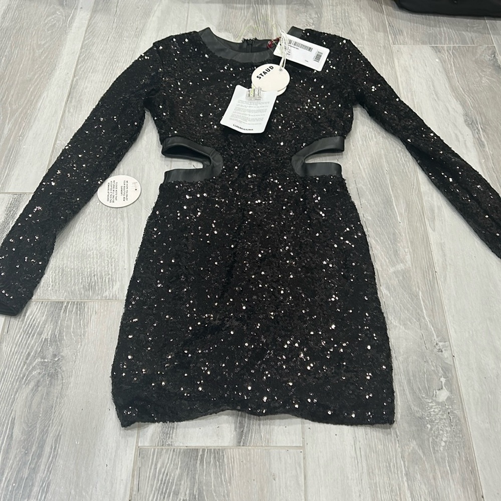 black sequin dress with side cut outs